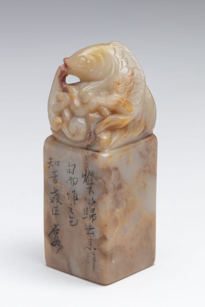 Zegelstempel met springende karper