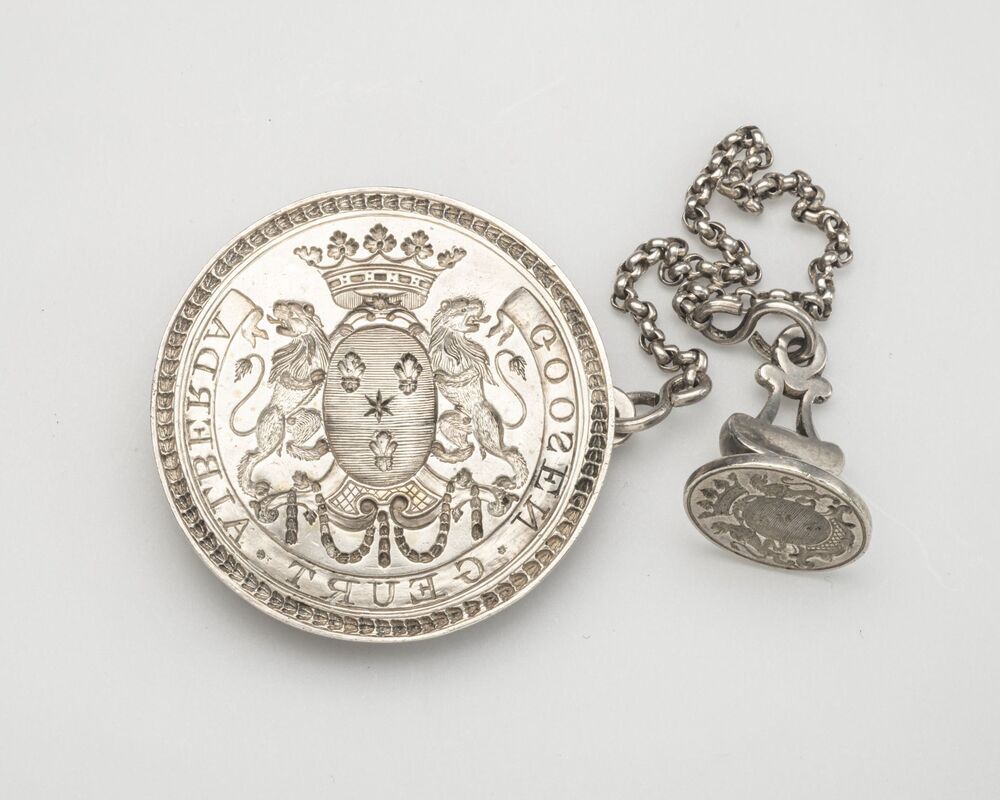 Zegelstempel en signet met wapen Goosen Geurt Alberda