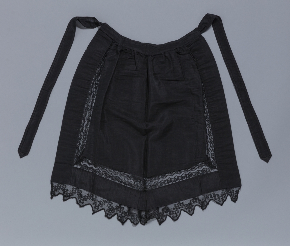 Schort met kant