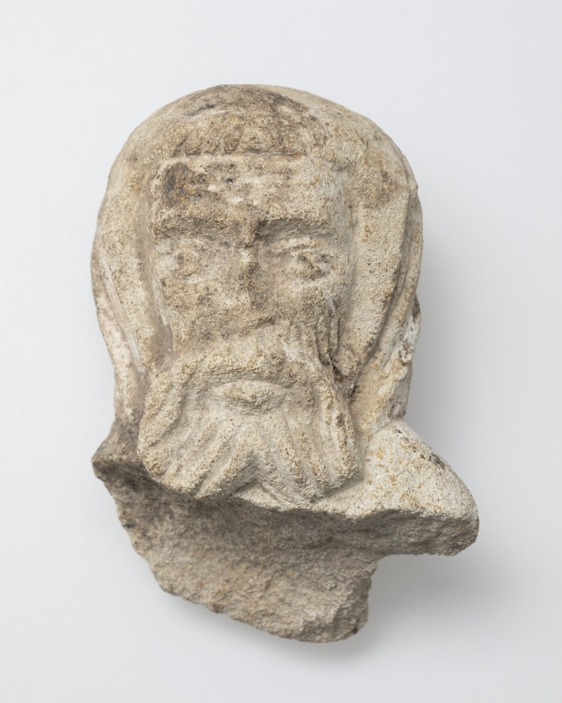 Fragment van een mannenhoofd