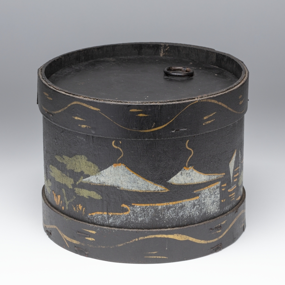 Spanen doos met berglandschap