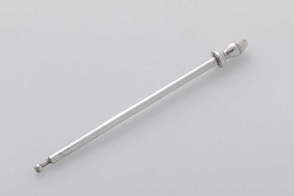 miniatuur schoorsteen-ijzer